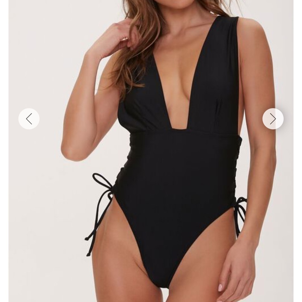 One piece stringy black plunging swimsuit